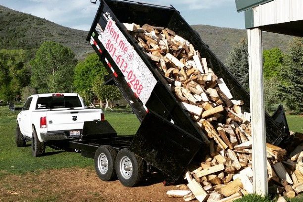 a truck is parked on the side of a mountain